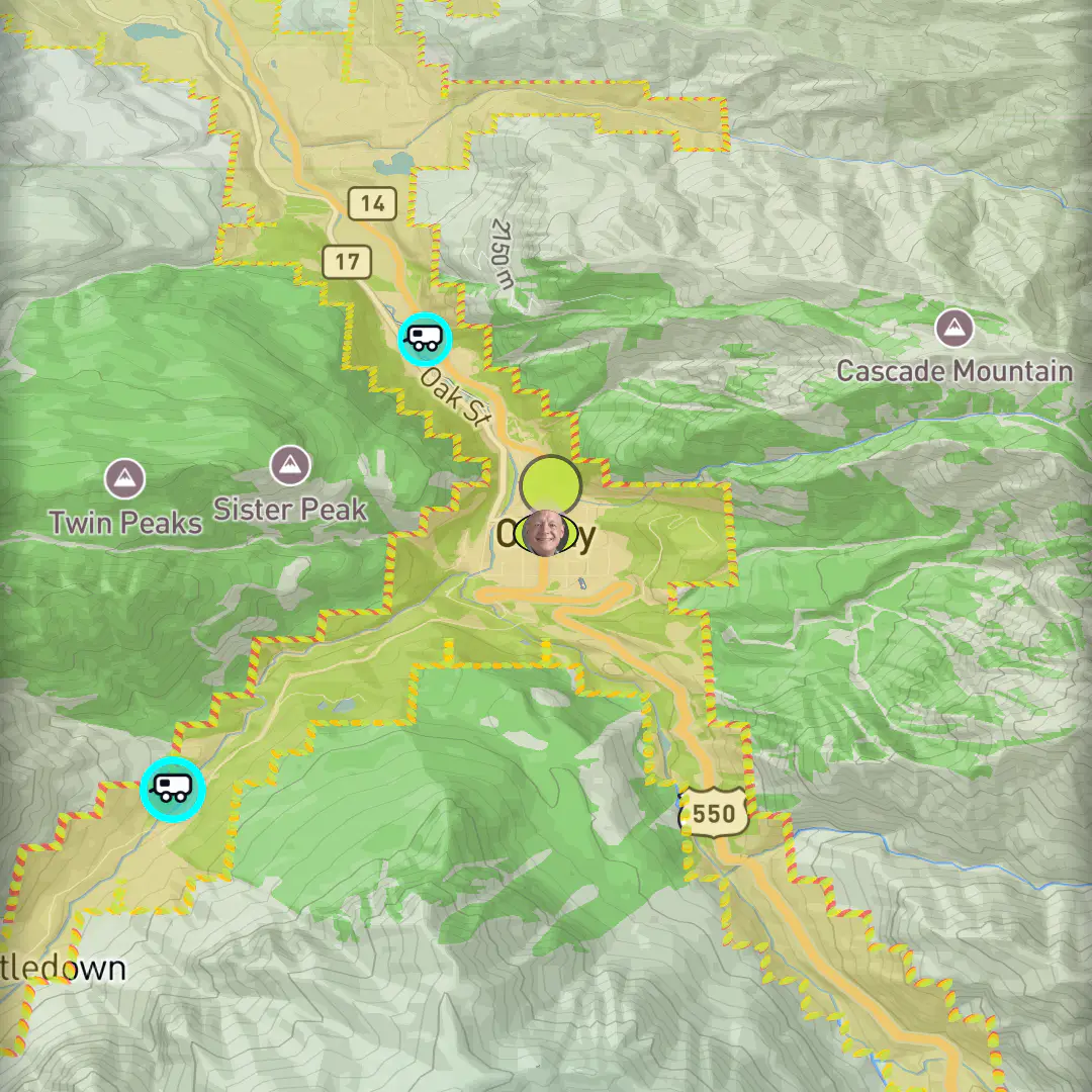 The reachability envelope around Ouray, Colorado — a shaded fill with a dotted amber and red boundary pinched by the canyon walls of US-550